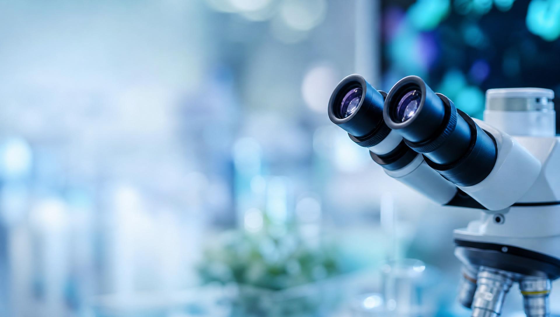 Abstract regenerative medicine research imagery — cells and scientific instrumentation.